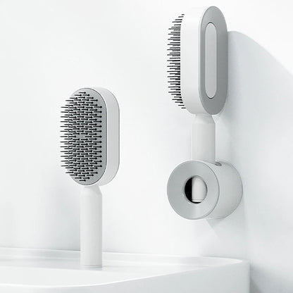 Brosse à cheveux autonettoyante